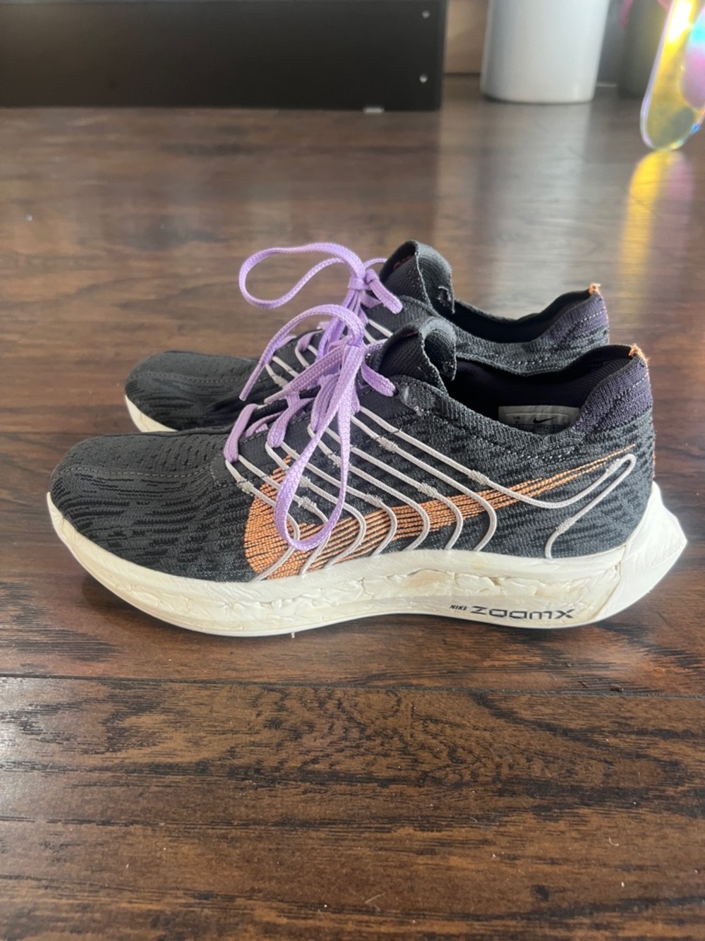 Nike Woman’s ZoomX running shoe grey/orange/purple size 9
